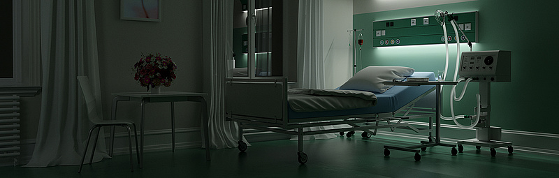 Leeres Krankenbett in einem dunklen Zimmer